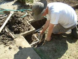 Scottsdale sprinkler repair specialist replaces an underground line and pop up head